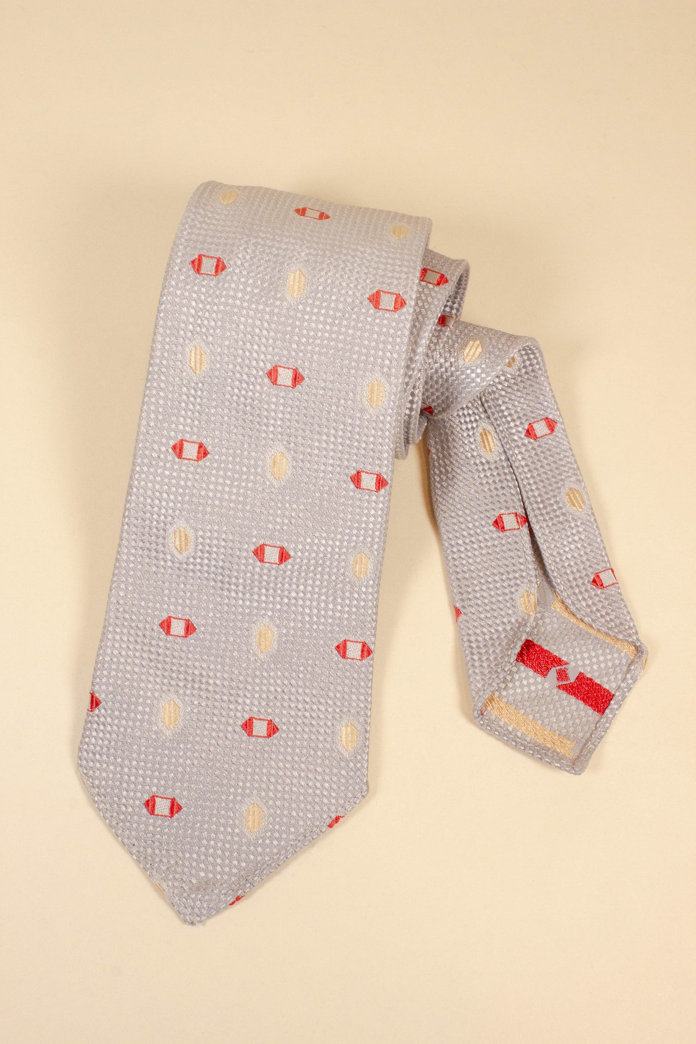 SWEDISH 1930S/1940S GREY DEADSTOCK TIE WITH RED AND YELLOW PATTERN