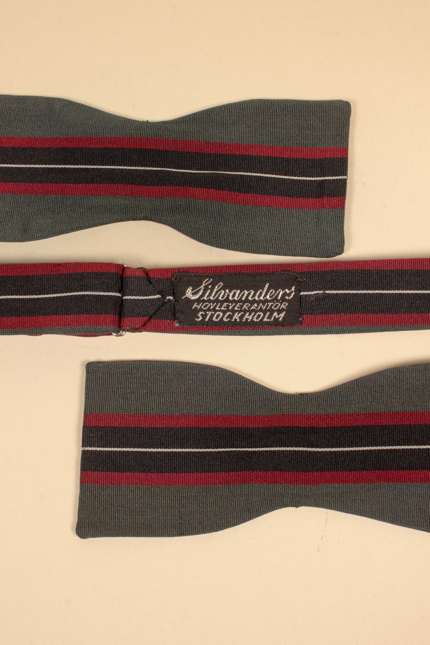 1940s/1950s green bow tie with red, black and white stripes