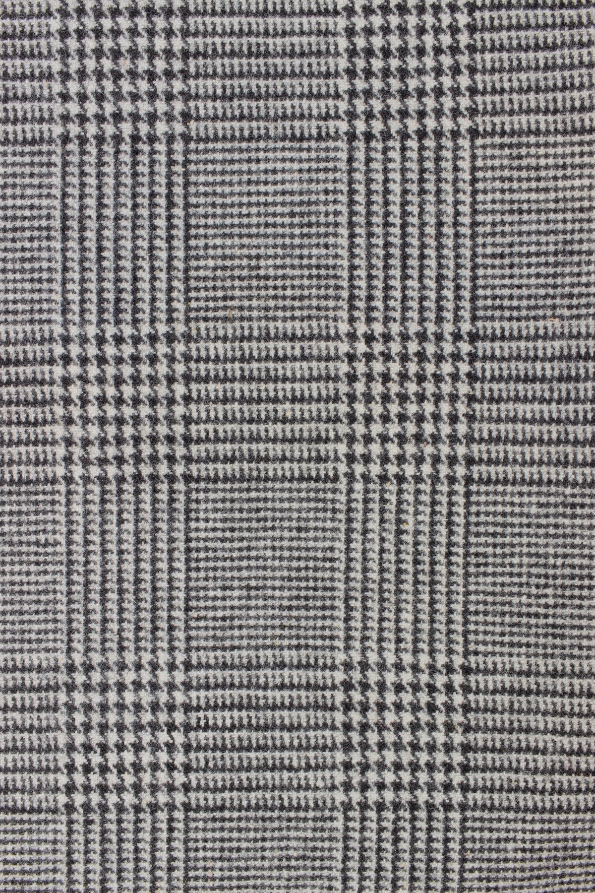 1940s/1950s dark grey prince of wales suiting fabric. Width 150 cm