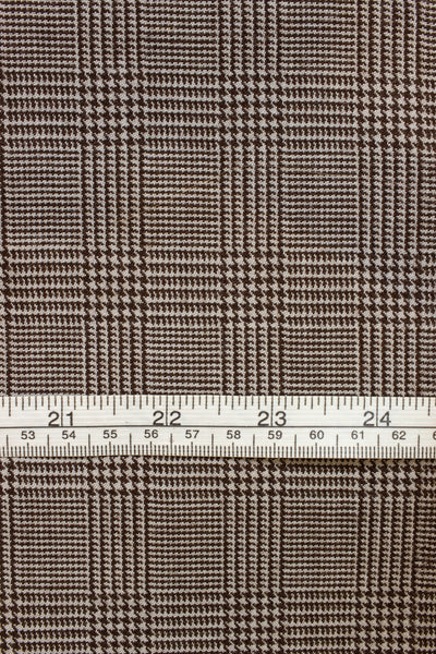 1940s/1950s dark brown prince of wales check. Width 150 cm