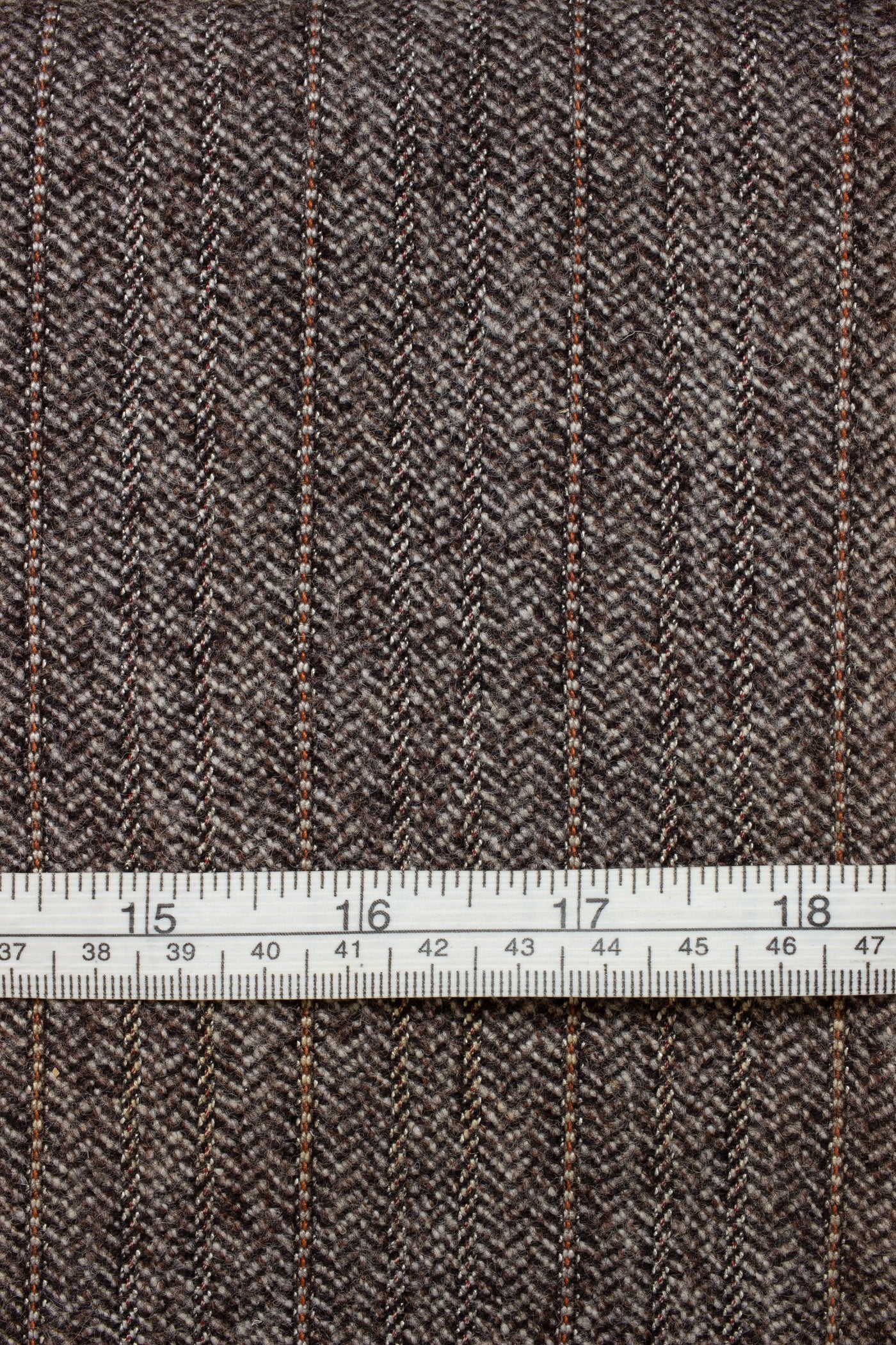 1920s/1930s brown herringbone suiting fabric. Width 160 cm.
