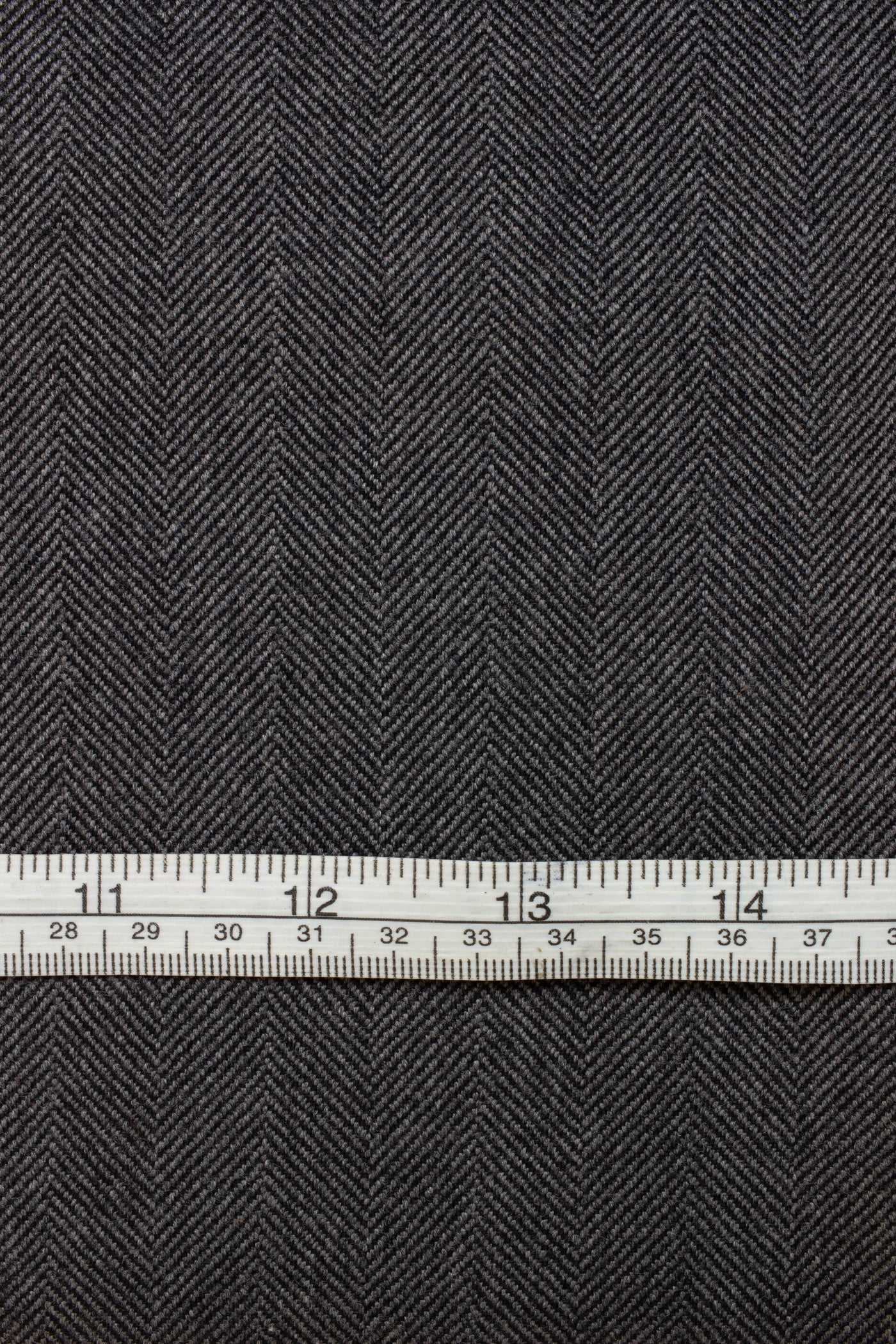 1930s/1940s mid-grey herringbone suiting/coating fabric. Width 148 cm